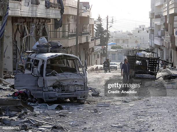 Barrel bomb attack on Aleppo by Assad forces destroy many houses and claim many lives, April 26, 2014.