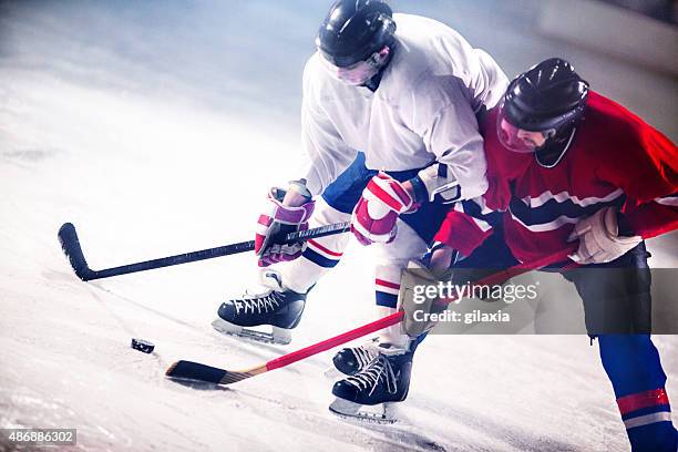 eishockey-spiel. - hockey ice stock-fotos und bilder