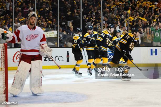 Milan Lucic of the Boston Bruins scores a goal against the Detroit Red Wings in Game Five of the First Round of the 2014 Stanley Cup Playoffs at TD...