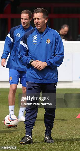 Dagenham & Redbridge first team coach Darren Currie looks on as the players warm up prior to the Sky Bet League Two match between Dagenham &...