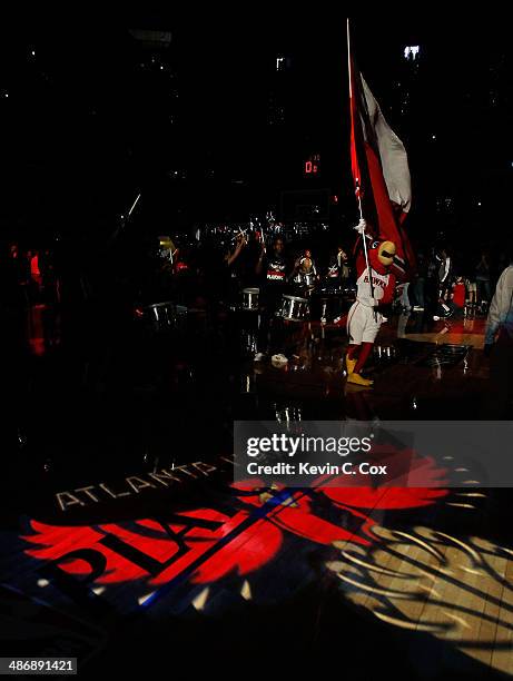 Harry the Hawk runs on the court prior to player introductions of the Atlanta Hawks in Game Four of the Eastern Conference Quarterfinals during the...