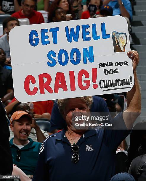 Fan holds up a sign for sideline reporter Craig Sager in Game Four of the Eastern Conference Quarterfinals during the 2014 NBA Playoffs between the...