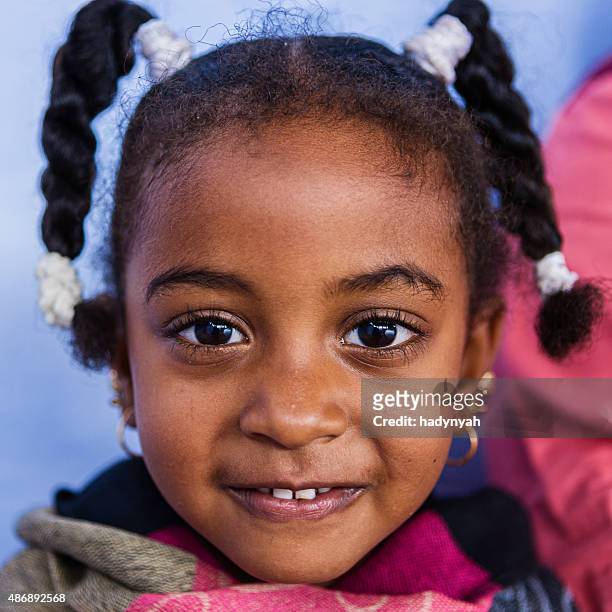 beautiful muslim little girl in southern egypt - sudanese girls stock pictures, royalty-free photos & images