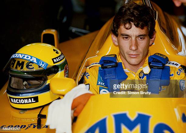 Ayrton Senna of Brazil sits aboard the Camel Team Lotus Honda Lotus 99T Honda RA166E V6 turbo during practice for the Brazilian Grand Prix on 11th...