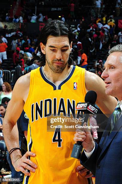 Luis Scola of the Indiana Pacers gets interviewed after the game against the Atlanta Hawks during Game Four of the Eastern Conference Quarterfinals...