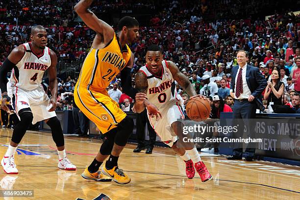 Jeff Teague of the Atlanta Hawks drives to the basket against the Indiana Pacers during Game Four of the Eastern Conference Quarterfinals on April...