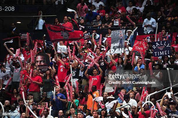 Fans of the Atlanta Hawks cheer their team on against the Indiana Pacers during Game Four of the Eastern Conference Quarterfinals on April 26, 2014...