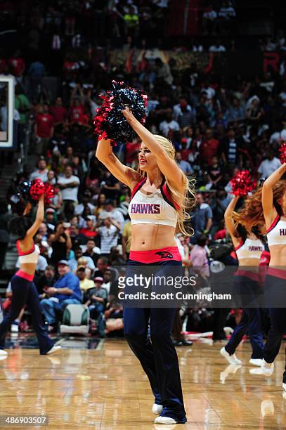 Dancer of the Atlanta Hawks gets the crowd pumped up against the Indiana Pacers during Game Four of the Eastern Conference Quarterfinals on April 26,...