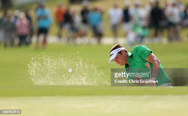 Jeff Overton chips out of the 18th bunker during Round Three of the Zurich Classic of New Orleans at TPC Louisiana on April 26, 2014 in Avondale,...
