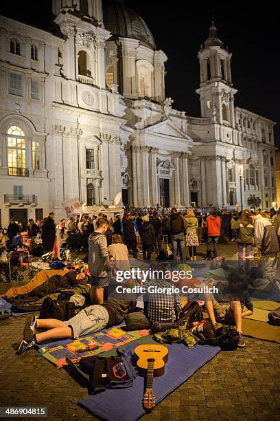 Pilgrims attend a Mass celebration in front of the Church of Santa Agense in Agona, at Piazza Navona on April 26, 2014 in Rome, Italy. Dignitaries,...