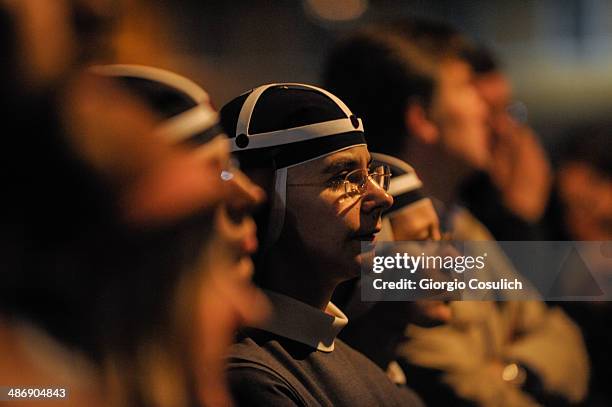 Group of nuns attend a Mass celebration in front of the Church of Santa Agense in Agona, at Piazza Navona on April 26, 2014 in Rome, Italy....