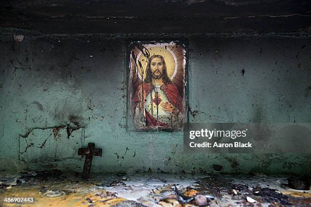 cross and wax from candles under photo - mexican catholic stock pictures, royalty-free photos & images