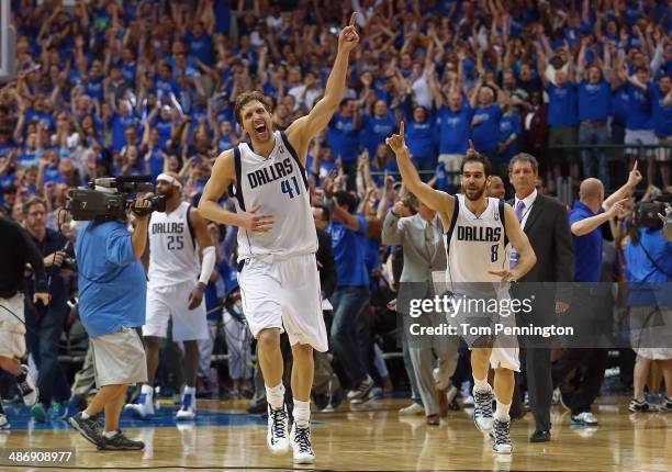 Dirk Nowitzki of the Dallas Mavericks and Jose Calderon of the Dallas Mavericks celebrate after the Dallas Mavericks beat the San Antonio Spurs...