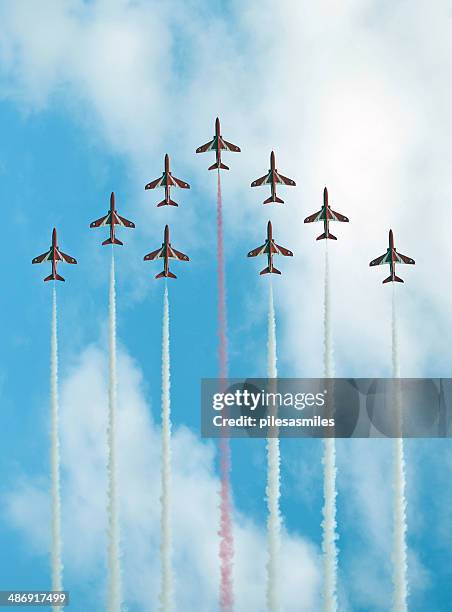 red arrows display - red arrow plane stock pictures, royalty-free photos & images