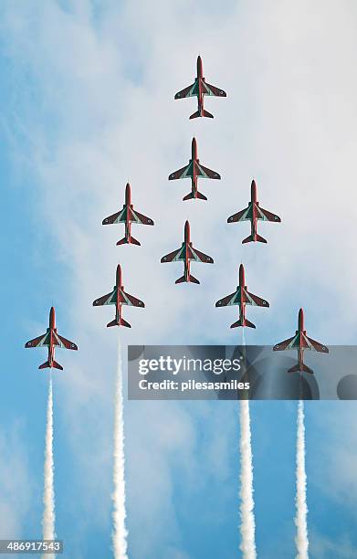 red arrows display - red arrow plane stock pictures, royalty-free photos & images