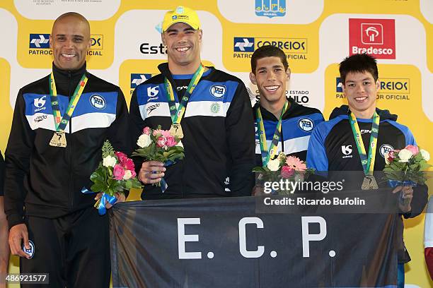 Joao Junior, Joao de Lucca, Guilherme Rosolen and Fabio Santi in the cerimony award after win the 4x100m Medley Relay Final on day six of the Maria...