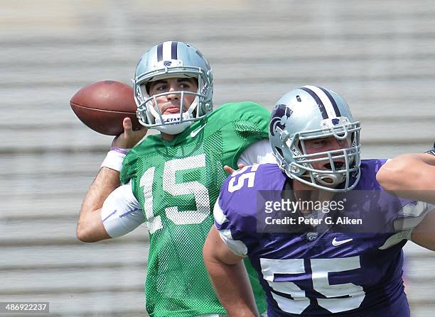 Quarterback Jake Waters of the Kansas State Wildcats throws a pass down field during the Spring Game on April 26, 2014 at Bill Snyder Family Stadium...