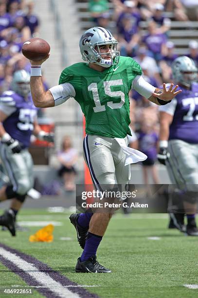 Quarterback Jake Waters of the Kansas State Wildcats throws a pass down field during the Spring Game on April 26, 2014 at Bill Snyder Family Stadium...