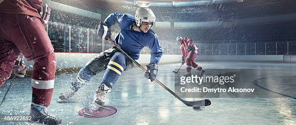 ice hockey players in action - ice hockey close up stock pictures, royalty-free photos & images