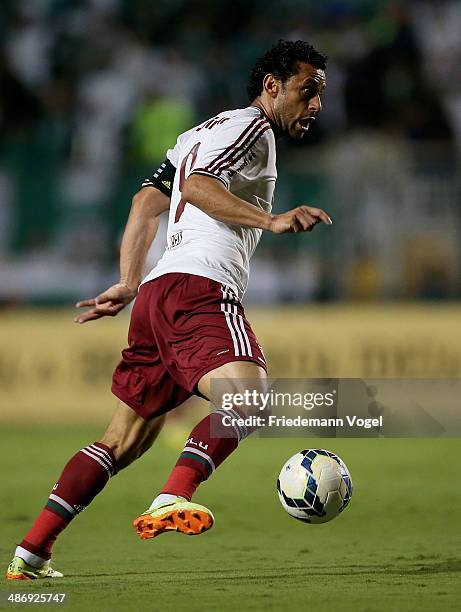 Fred of Fluminense runs with the ball during the match between Palmeiras and Fluminense for the Brazilian Series A 2014 at Estadio do Pacaembu on...