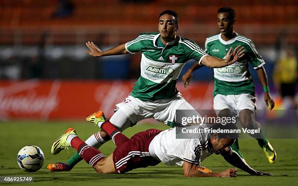 Tiago Alves of Palmeiras fights for the ball with Fred of Fluminense during the match between Palmeiras and Fluminense for the Brazilian Series A...