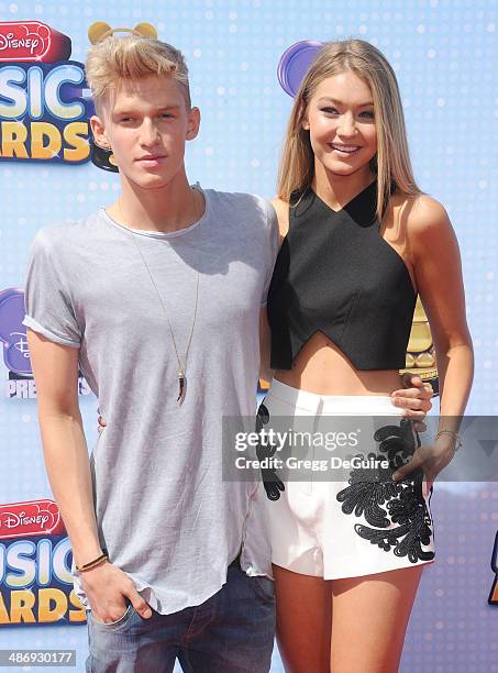 Singer Cody Simpson and model Gigi Hadid arrive at the 2014 Radio Disney Music Awards at Nokia Theatre L.A. Live on April 26, 2014 in Los Angeles,...