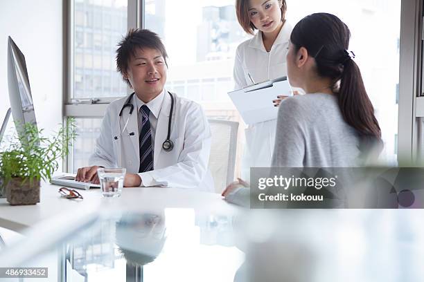patients to consult a doctor at the hospital - puke japan stock pictures, royalty-free photos & images