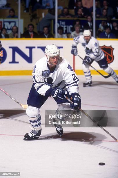 Kirk Muller of the Toronto Maple Leafs skates with the puck during an NHL game against the St. Louis Blues on November 5, 1996 at the Maple Leaf...