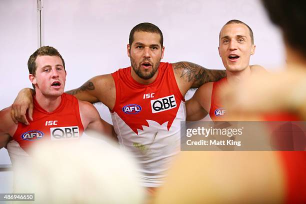 Lance Franklin of the Swans sings the club song with team mates after the round 23 AFL match between the Sydney Swans and the Gold Coast Suns at...