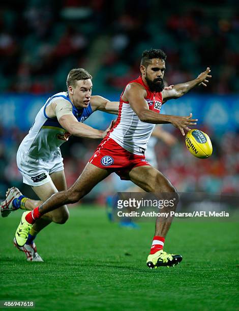 Lewis Jetta of the Swans kicks the ball during the round 23 AFL match between the Sydney Swans and the Gold Coast Suns at Sydney Cricket Ground on...