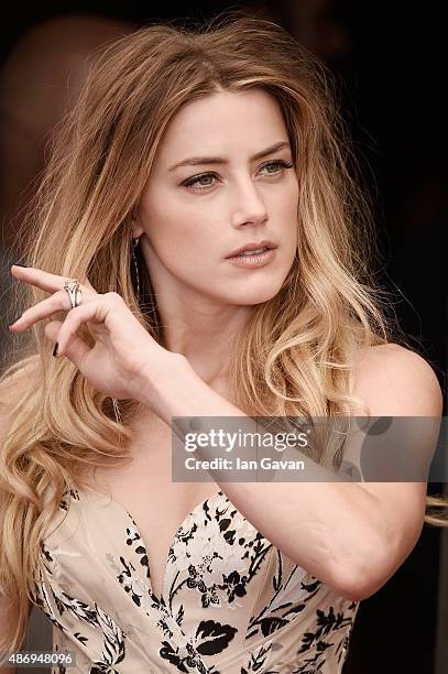 Actress Amber Heard attends a photocall for 'The Danish Girl' during the 72nd Venice Film Festival at Palazzo del Casino on September 5, 2015 in...