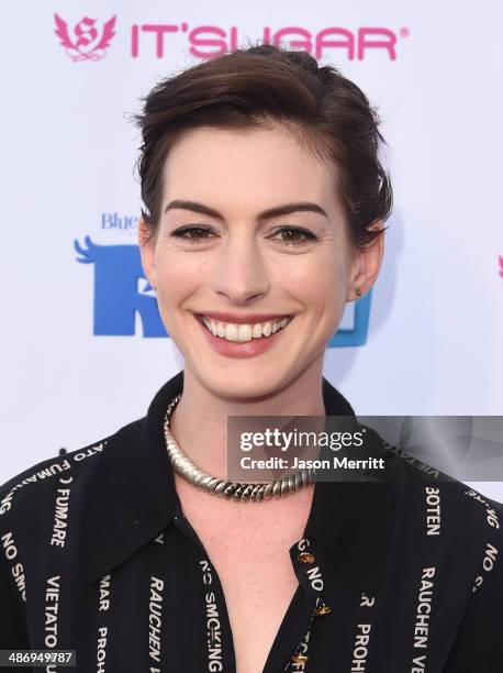 Actress Anne Hathaway attends the Lollipop Theater Network's Night Under The Stars Screening Of Twentieth Century Fox's "Rio 2" Hosted by Anne...