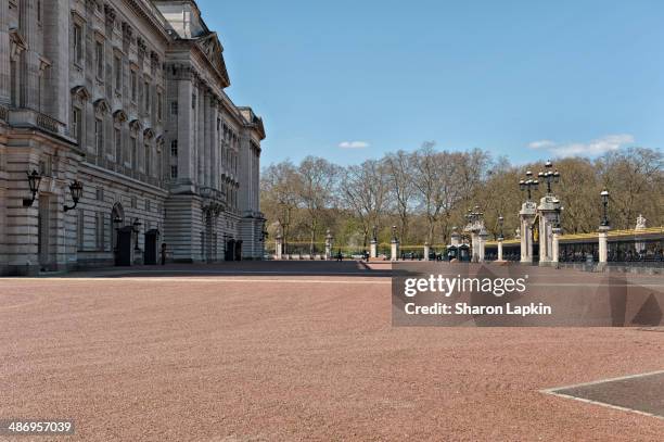 View from behind the gates of Buckingham Palace looking out.