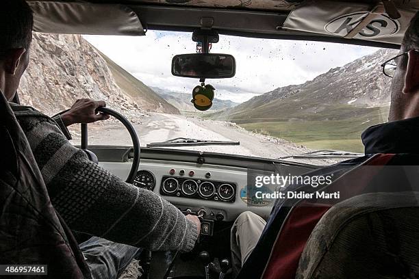 Driving along the Pamir Highway in a Russian jeep, the UAZ in Kyrgyzstan