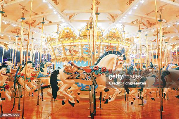 merry go round - carousel horses stock-fotos und bilder