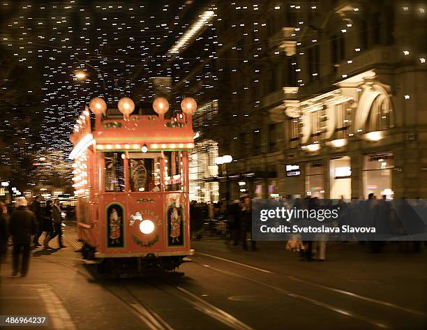 bright lights, big city! - tram zürich stock pictures, royalty-free photos & images