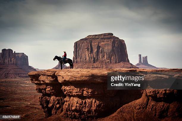 navajo cowboy in american southwest landscape - utah stock pictures, royalty-free photos & images