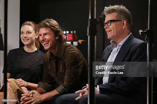 Rebecca Ferguson, Tom Cruise, and Director Christopher McQuarrie, reacts during a tele-broadcasting with fans in a cinema in Chengdu on August 5,...