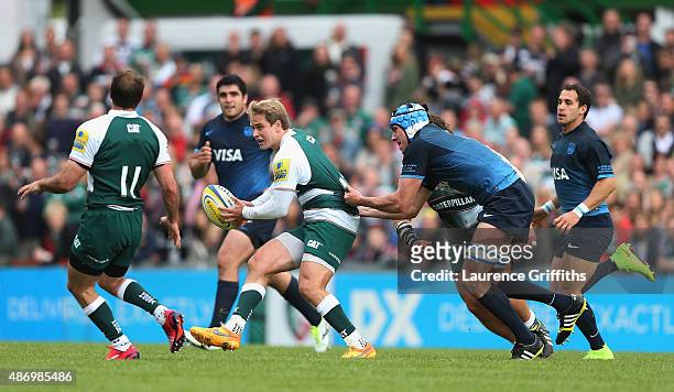 Mathew Tait of Leicester Tigers is tackled by Guido Petti Pagadizabal of Argentina during the Testimonial Challenge match between Leicester Tigers...