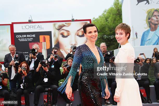 Lou de Laage and Juliette Binoche attend a premiere for 'The Wait' during the 72nd Venice Film Festival on September 5, 2015 in Venice, Italy.