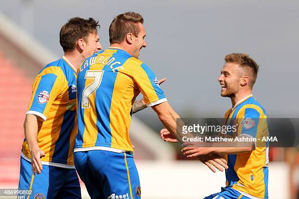 Liam Lawrence of Shrewsbury Town celebrates after his corner resulted in an own goal to make it 0-1 at Oakwell Stadium on September 5, 2015 in...