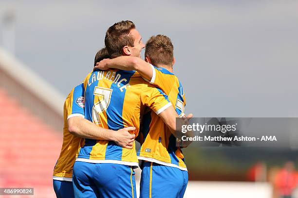 Liam Lawrence of Shrewsbury Town celebrates after his corner resulted in an own goal to make it 0-1 at Oakwell Stadium on September 5, 2015 in...