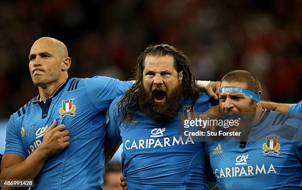 Italy players Sergio Parisse Martin Castrogiovanni and Matias Aguero sing the national anthem before the International match between Wales and...