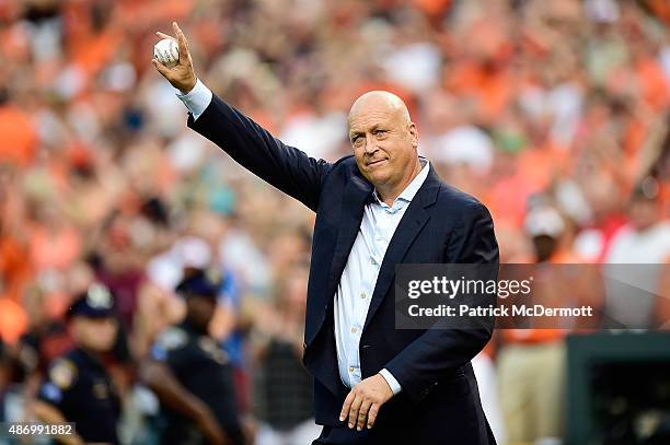 Hall of fame player and former Baltimore Orioles Cal Ripken Jr. Acknowledges the crowd before throwing out the ceremonial first pitch prior to the...