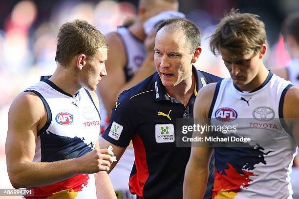 Crows coach Brenton Sanderson talks to Rory Laird during the round six AFL match between the Western Bulldogs and the Adelaide Crows at Etihad...