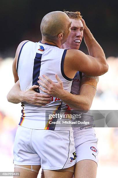 James Podsiadly and Tom Lynch of the Crows celebrate a goal during the round six AFL match between the Western Bulldogs and the Adelaide Crows at...