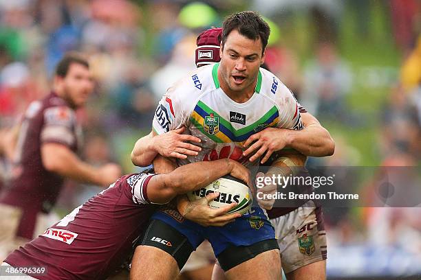 David Shillington of the Raiders is tackled by the Sea Eagles defence during the round 8 NRL match between the Manly-Warringah Sea Eagles and the...