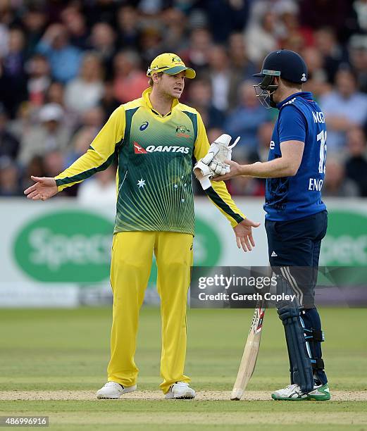 England captain Eoin Morgan argues with Australian captain Steven Smith after Ben Stokes of England is given out for disrupting the field during the...