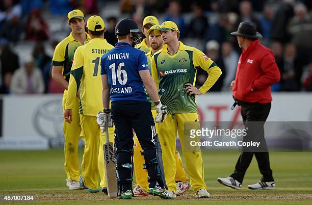 England captain Eoin Morgan speaks with Australian captain Steven Smith after the 2nd Royal London One-Day International match between England and...
