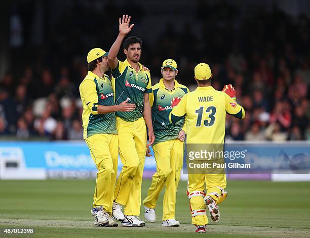 Mitchell Starc of Australia celebrates taking the wicket of Liam Plunkett of England during the 2nd Royal London One-Day International match between...